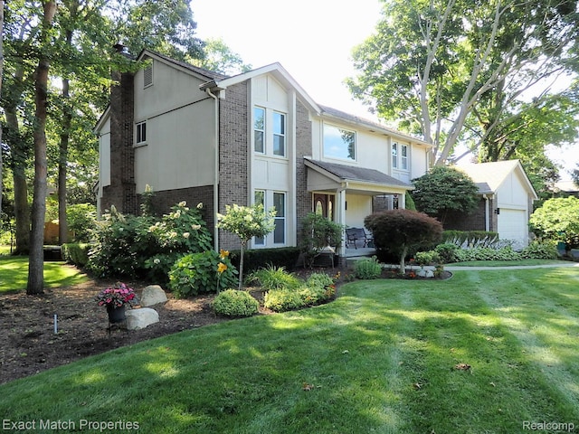 3742 Hearthstone Dr, Commerce Twp, MI 48382 - view of front facade featuring brick siding and a front lawn