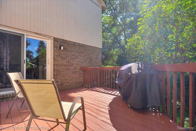 3742 Hearthstone Dr, Commerce Twp, MI 48382 - wooden terrace featuring a grill