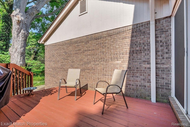 3742 Hearthstone Dr, Commerce Twp, MI 48382 - wooden deck with a grill