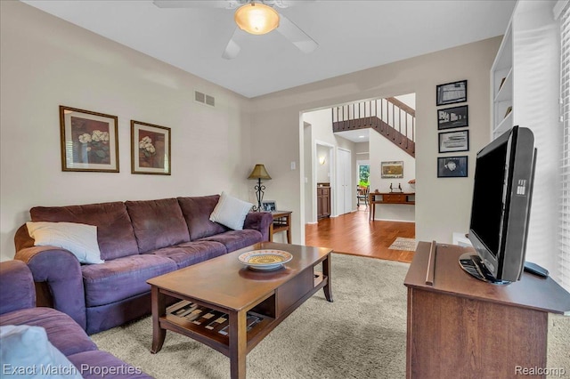 3742 Hearthstone Dr, Commerce Twp, MI 48382 - living area featuring a ceiling fan and light wood-type flooring