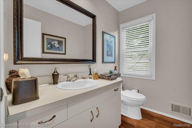 3742 Hearthstone Dr, Commerce Twp, MI 48382 - bathroom featuring vanity and wood finished floors