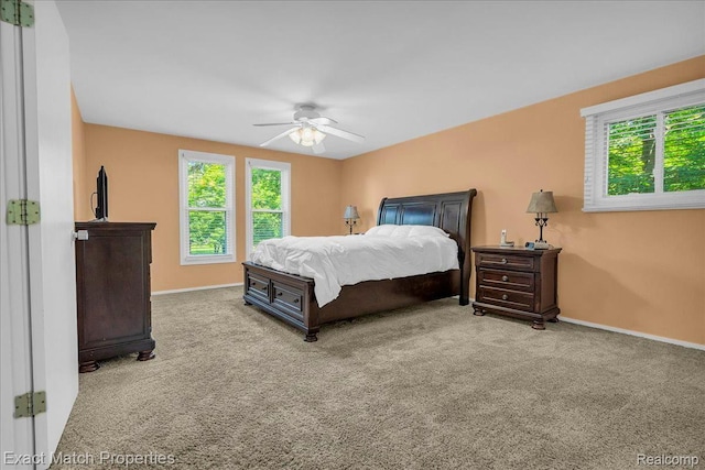 3742 Hearthstone Dr, Commerce Twp, MI 48382 - carpeted bedroom with multiple windows and ceiling fan