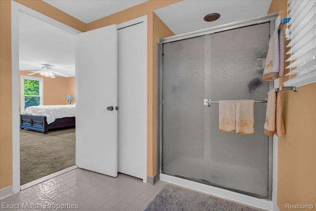 3742 Hearthstone Dr, Commerce Twp, MI 48382 - bathroom featuring a stall shower, connected bathroom, ceiling fan, and tile patterned flooring