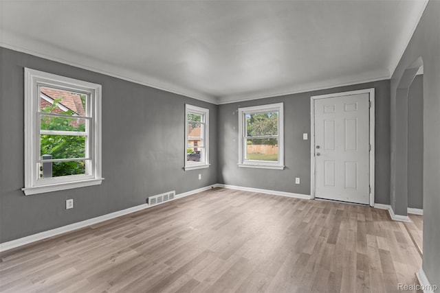 17631 Kentfield St, Detroit, MI 48219 - spare room featuring light wood finished floors and crown molding