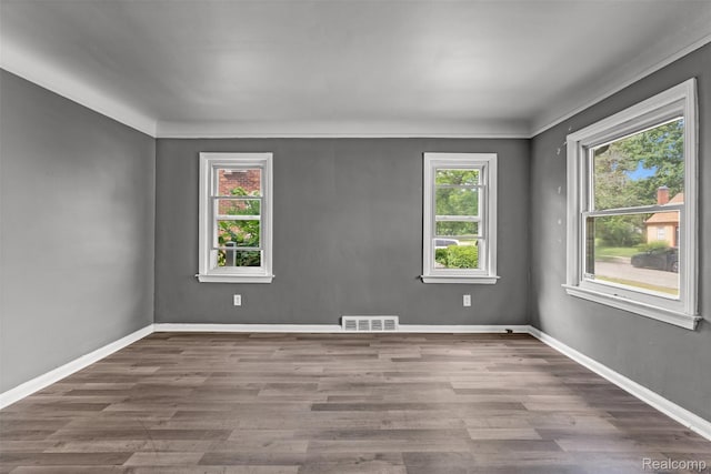 17631 Kentfield St, Detroit, MI 48219 - spare room featuring wood finished floors and baseboards