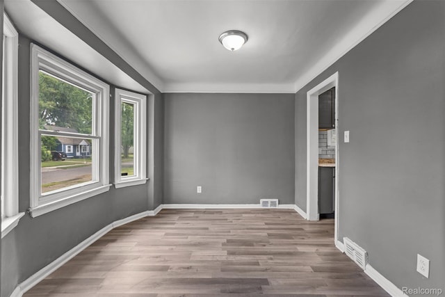 17631 Kentfield St, Detroit, MI 48219 - spare room featuring wood finished floors and baseboards