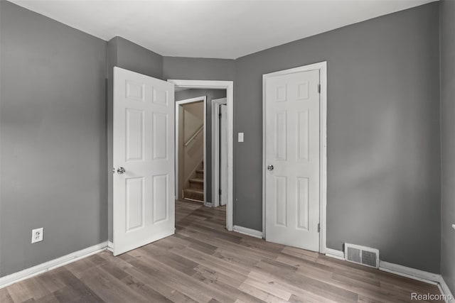 17631 Kentfield St, Detroit, MI 48219 - unfurnished bedroom featuring baseboards and wood finished floors