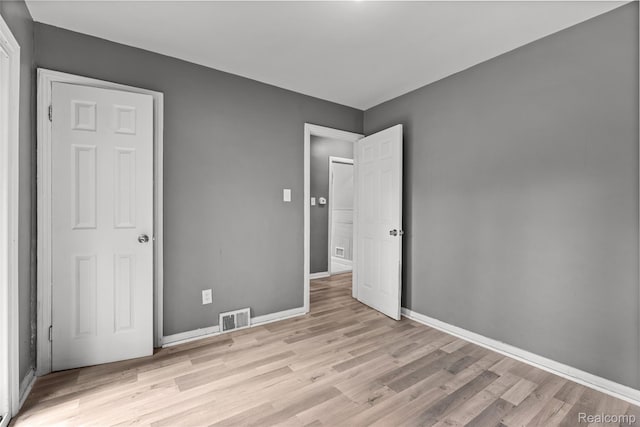 17631 Kentfield St, Detroit, MI 48219 - unfurnished bedroom featuring light wood-style floors and baseboards