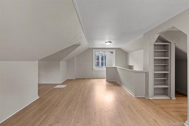 17631 Kentfield St, Detroit, MI 48219 - additional living space featuring light wood-type flooring, lofted ceiling, and built in shelves