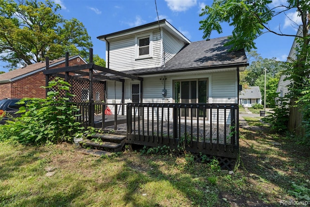 17631 Kentfield St, Detroit, MI 48219 - rear view of house featuring a deck and roof with shingles