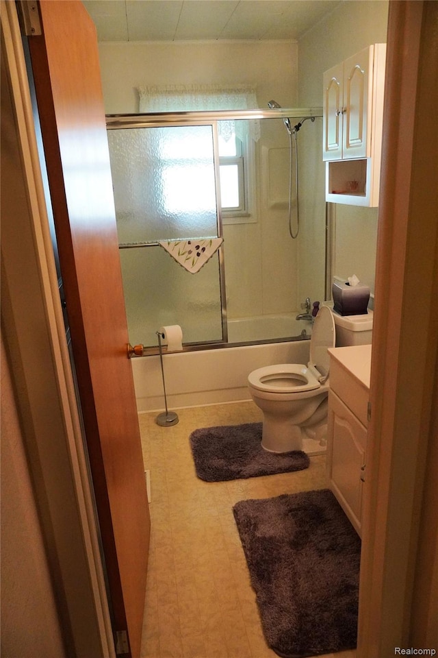 1295 Hadley Rd, Lapeer, MI 48446 - full bathroom with enclosed tub / shower combo, vanity, and tile patterned floors
