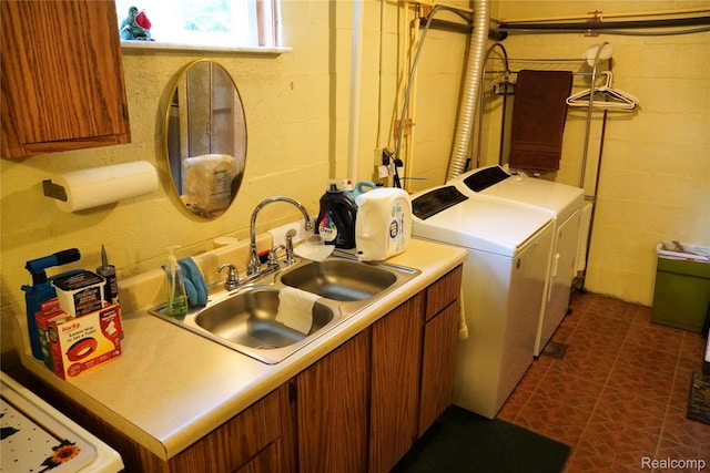 1295 Hadley Rd, Lapeer, MI 48446 - washroom with cabinet space, washing machine and clothes dryer, and concrete block wall