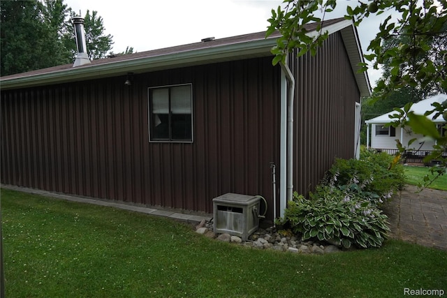 1295 Hadley Rd, Lapeer, MI 48446 - view of property exterior featuring a yard