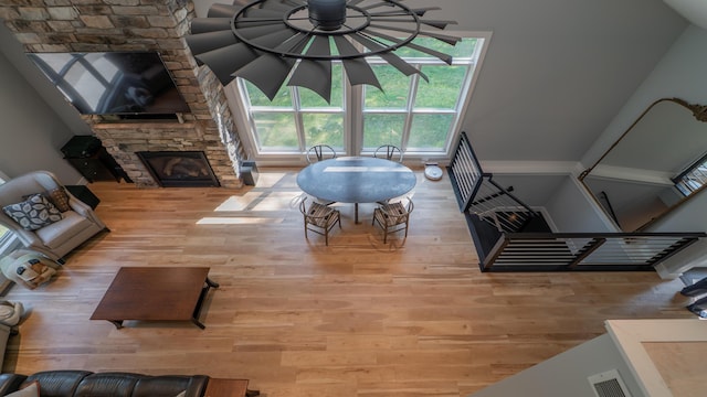 2816 Niles Buchanan Rd, Buchanan, MI 49107 - living room featuring wood finished floors, healthy amount of natural light, and a stone fireplace