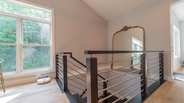 2816 Niles Buchanan Rd, Buchanan, MI 49107 - staircase featuring wood finished floors and lofted ceiling
