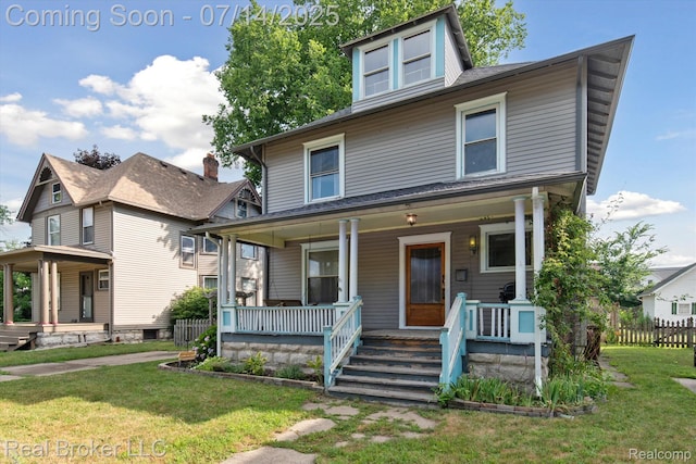 305 E 6th St, Monroe, MI 48161 - american foursquare style home with a porch