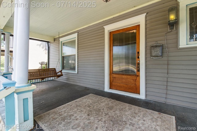 305 E 6th St, Monroe, MI 48161 - doorway to property with a porch