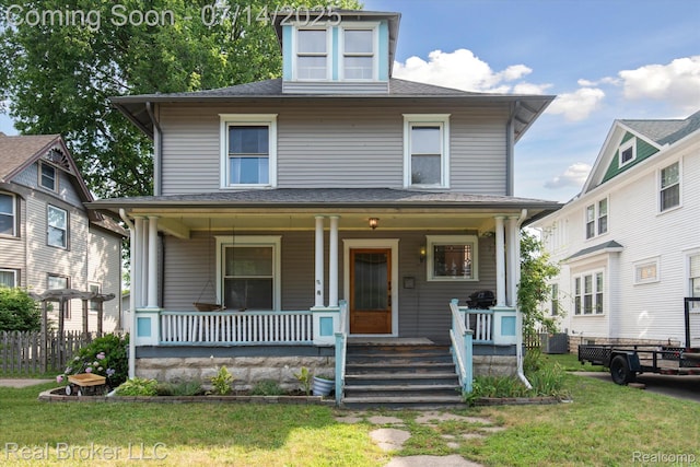 305 E 6th St, Monroe, MI 48161 - traditional style home featuring a porch and roof with shingles