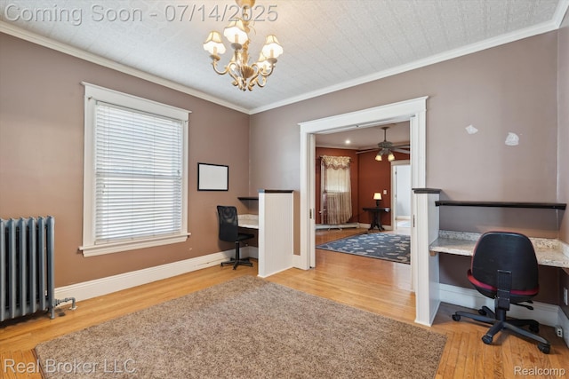 305 E 6th St, Monroe, MI 48161 - office area featuring radiator heating unit, wood finished floors, a chandelier, and ornamental molding