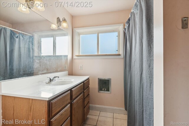 305 E 6th St, Monroe, MI 48161 - full bath featuring vanity and tile patterned flooring