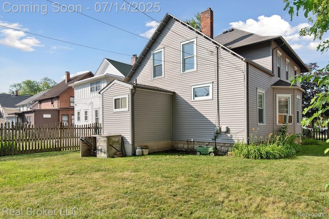 305 E 6th St, Monroe, MI 48161 - rear view of property with a chimney