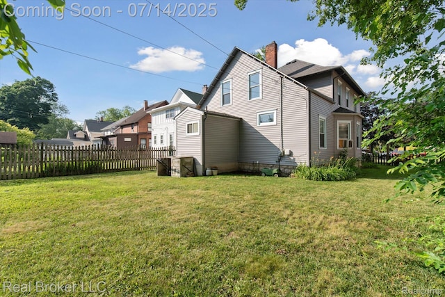 305 E 6th St, Monroe, MI 48161 - rear view of house with a chimney