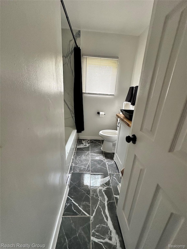20245 Archdale St, Detroit, MI 48235 - full bathroom featuring marble look tiles, vanity, and bathing tub / shower combination