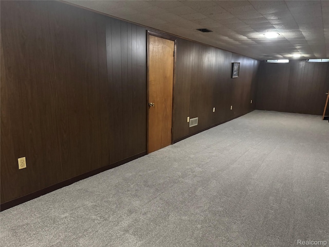 392 Hollywood Dr, Saline, MI 48176 - finished basement with carpet floors and wooden walls