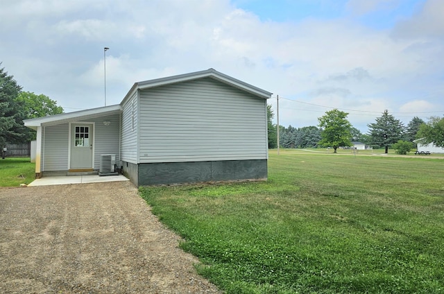 5955 N Pendell Rd, Elwell, MI 48832 - view of property exterior with a yard and driveway