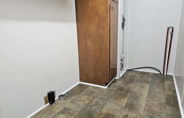 5955 N Pendell Rd, Elwell, MI 48832 - laundry room featuring baseboards