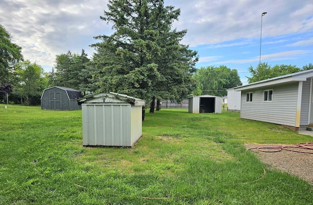 5955 N Pendell Rd, Elwell, MI 48832 - view of grassy yard with a storage unit