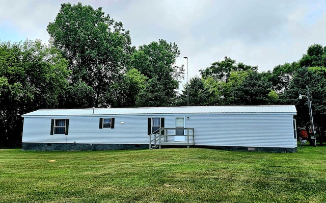 5955 N Pendell Rd, Elwell, MI 48832 - manufactured / mobile home with crawl space, a front lawn, and a metal roof