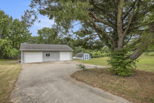 13280 Bradshaw St NE, Gowen, MI 49326 - detached garage with a storage shed