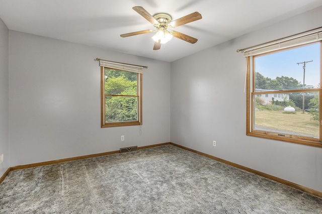13280 Bradshaw St NE, Gowen, MI 49326 - spare room featuring carpet floors and ceiling fan