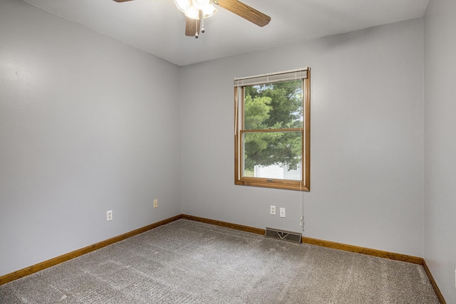 13280 Bradshaw St NE, Gowen, MI 49326 - carpeted empty room featuring a ceiling fan and baseboards