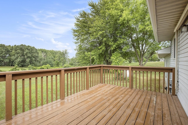 13280 Bradshaw St NE, Gowen, MI 49326 - wooden deck featuring a yard and view of wooded area