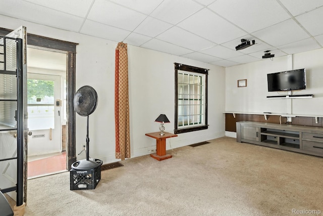 2424 10th Ave, Port Huron, MI 48060 - unfurnished living room with a drop ceiling and carpet floors