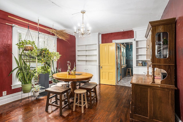 429 Portage Ave, Three Rivers, MI 49093 - dining room featuring hardwood / wood-style floors and a chandelier