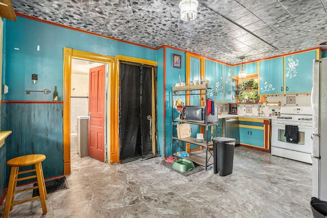 429 Portage Ave, Three Rivers, MI 49093 - kitchen featuring stainless steel appliances and crown molding