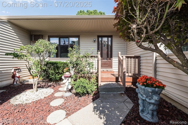 25104 Hamilton Ct Unit 4, South Lyon, MI 48178 - doorway to property featuring covered porch