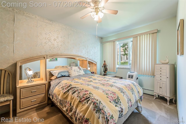 25104 Hamilton Ct Unit 4, South Lyon, MI 48178 - bedroom featuring carpet flooring, baseboard heating, and a ceiling fan