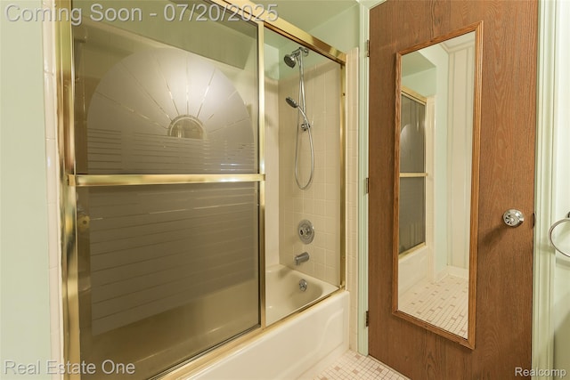 25104 Hamilton Ct Unit 4, South Lyon, MI 48178 - bathroom featuring bath / shower combo with glass door and tile patterned floors