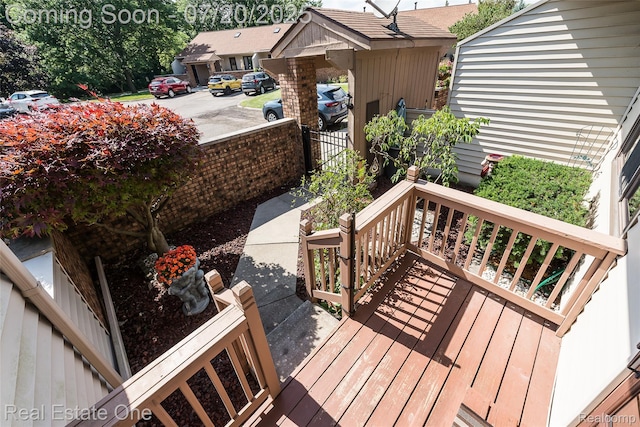 25104 Hamilton Ct Unit 4, South Lyon, MI 48178 - view of wooden terrace