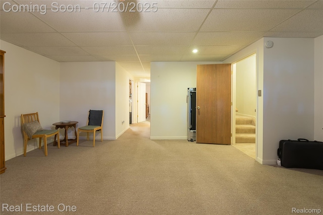 25104 Hamilton Ct Unit 4, South Lyon, MI 48178 - sitting room featuring a drop ceiling, carpet, stairs, and recessed lighting