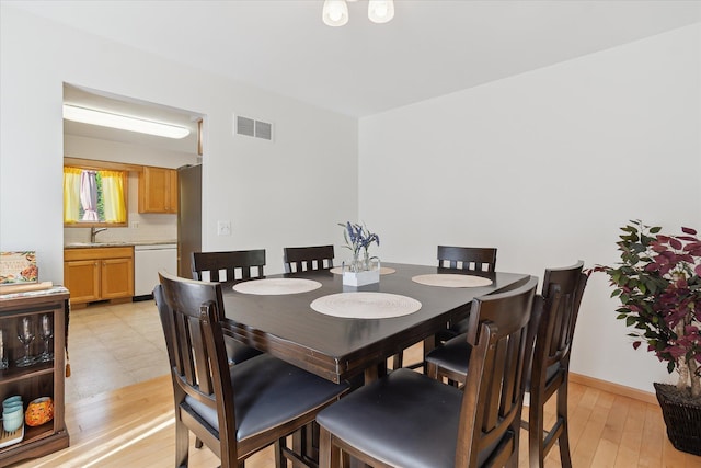 2388 Chestnut Cres, Saline, MI 48176 - dining room with light wood-type flooring