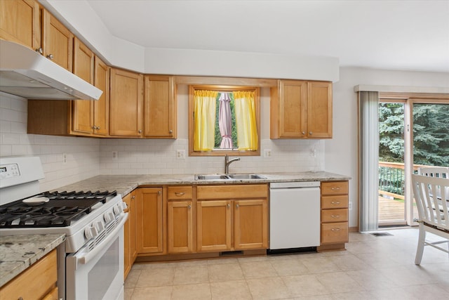 2388 Chestnut Cres, Saline, MI 48176 - kitchen featuring white appliances, under cabinet range hood, tasteful backsplash, light stone counters, and light tile patterned flooring