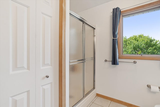2388 Chestnut Cres, Saline, MI 48176 - full bath with a stall shower, healthy amount of natural light, and tile patterned flooring