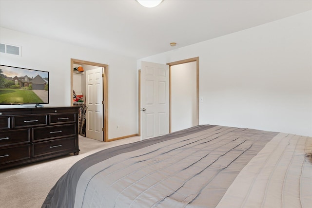 2388 Chestnut Cres, Saline, MI 48176 - bedroom with a spacious closet and light colored carpet