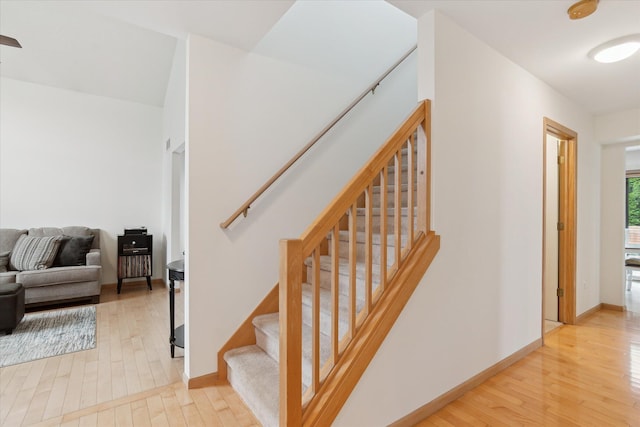 2388 Chestnut Cres, Saline, MI 48176 - stairway with wood finished floors and baseboards