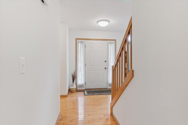 2388 Chestnut Cres, Saline, MI 48176 - entrance foyer with light wood-type flooring and stairway
